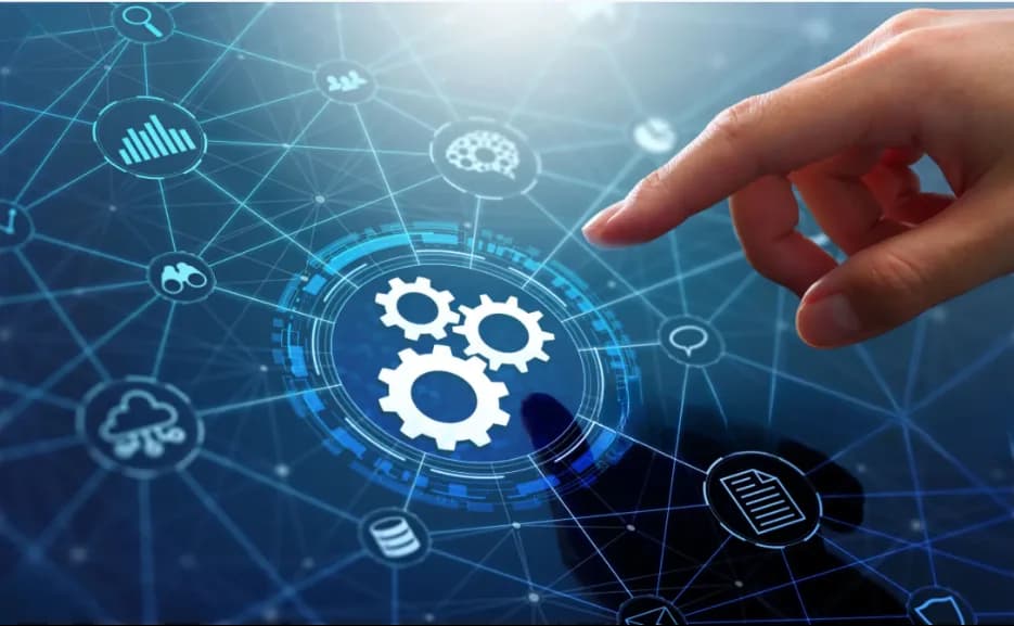 A finger touching a gear icon in a network of linked symbols